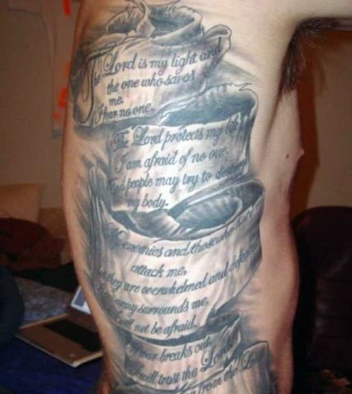 Side tattoo with Bible verses and an illustration of a cross and wings