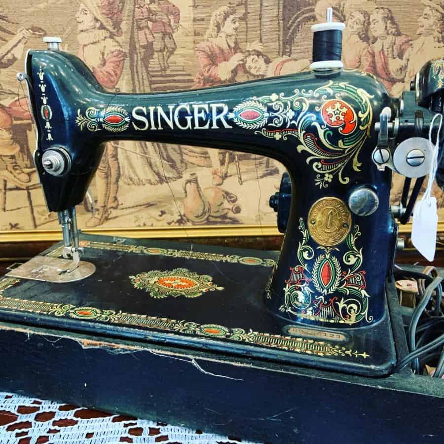Vintage Singer sewing machine with ornate floral designs