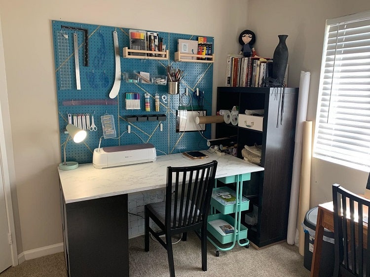 sewing workspace blue pegboard ideas