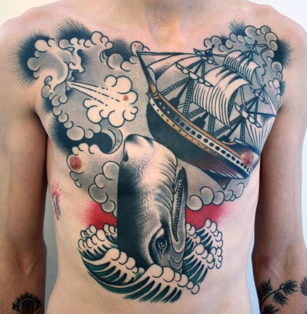 Chest tattoo of a ship and whale in a traditional style with clouds and waves