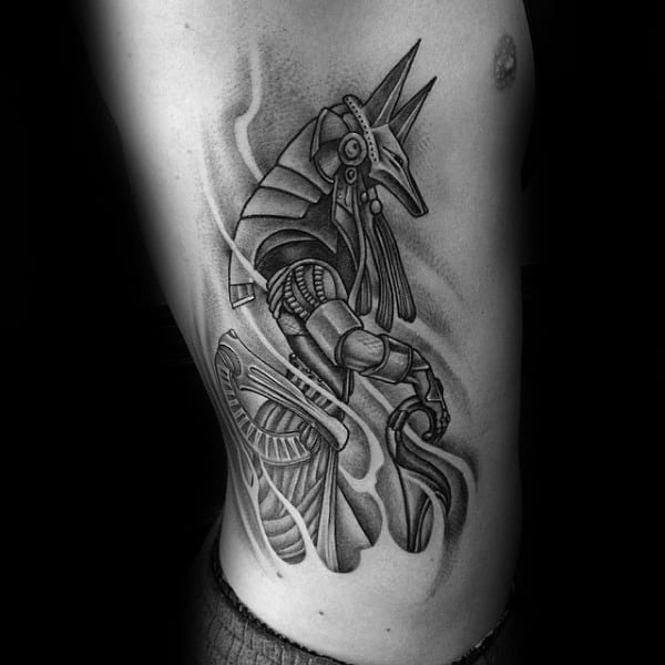 Shaded Black And Grey Anubis Rib Cage Tattoo Designs For Men