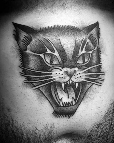 Bold blackwork roaring cat tattoo on the chest, featuring sharp lines and intense shading for a fierce and striking design.