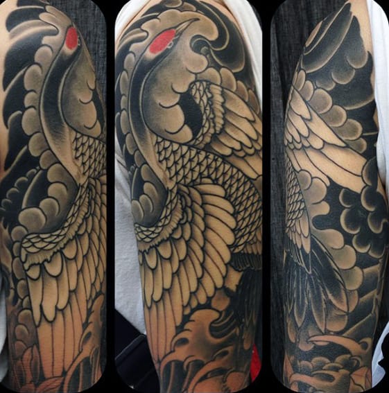 Shaded Black And Grey Clouds With Japanese Crane Mens Sleeve Tattoo