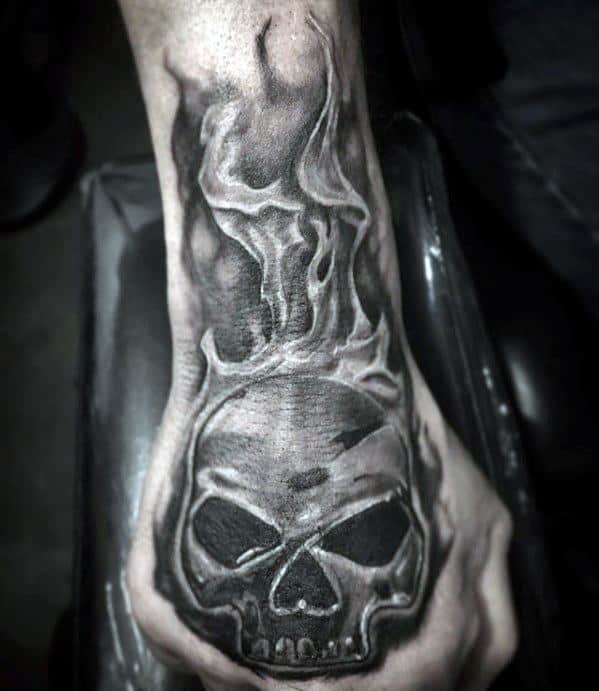 Shaded Black And Grey Hand Flaming Skull Guys Tattoos