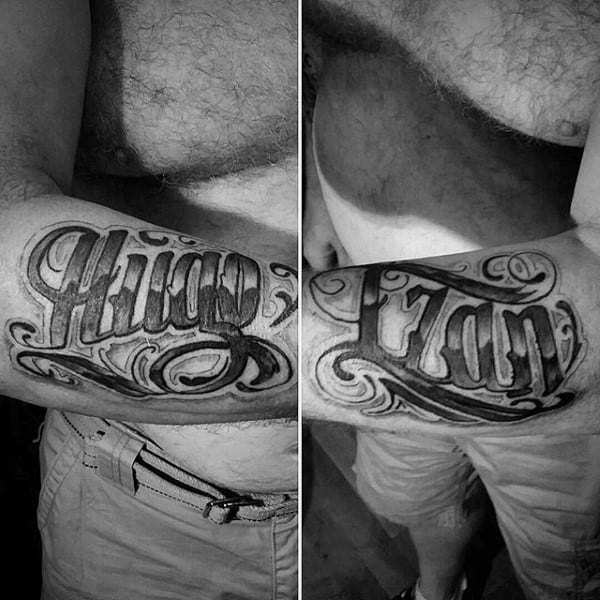 Shaded Black And Grey Male Name Tattoo On Outer Forearm