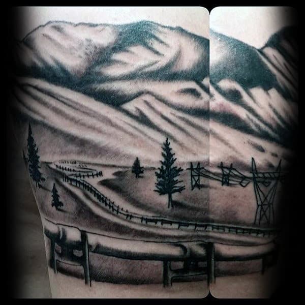 Shaded Black And Grey Mens Oilfield Landscape Tattoo Ideas On Arm