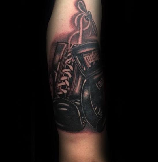 Shaded Black Boxing Gloves Tattoo With White Laces Mens Arm Tattoos