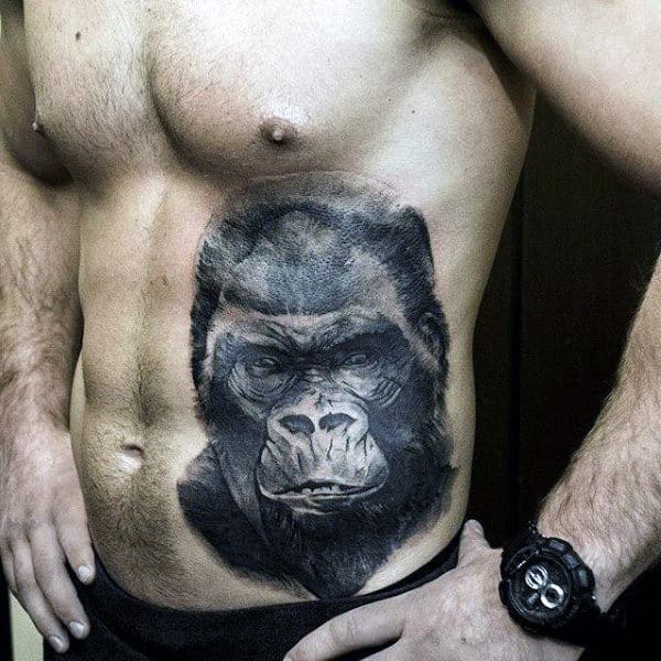 Shaded Black Ink Guys Insane Gorilla Face Tattoo On Rib Cage Side