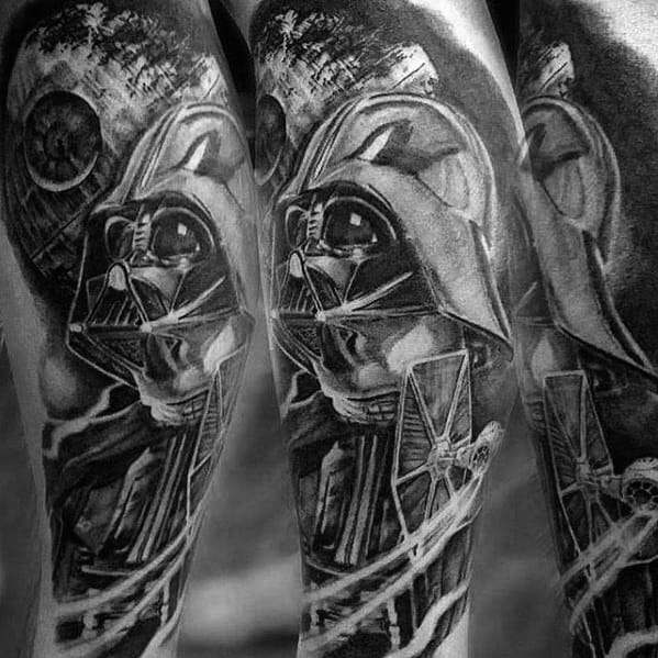 Black and grey tattoo showcasing Darth Vader, the Death Star, and TIE Fighters in stunning detail