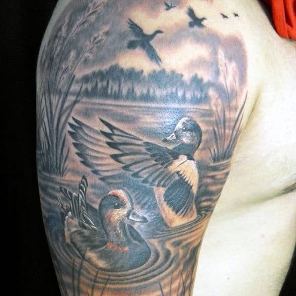 Shaded Ducks In Pond Half Sleeve Tattoo On Man