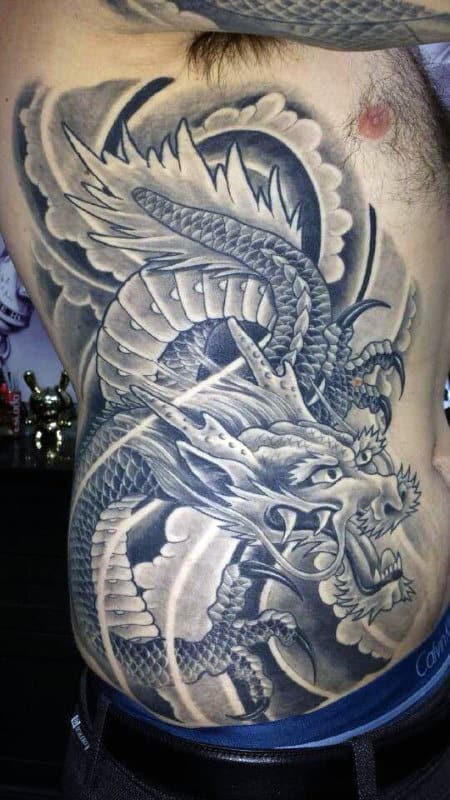 Shaded Grey Chinese Dragon Mens Rib Cage Side Of Body Tattoo