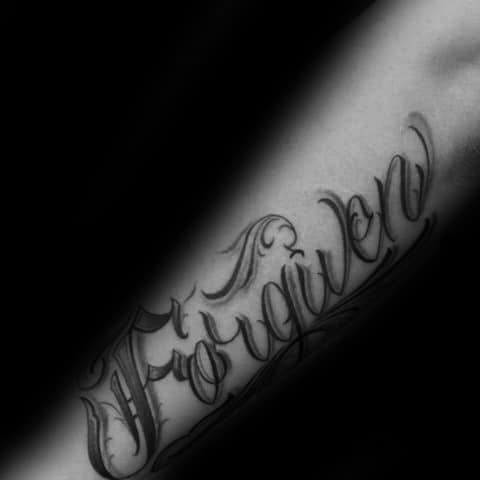 Shaded Guys Decorative Forgiven Word Tattoo Designs On Outer Forearm