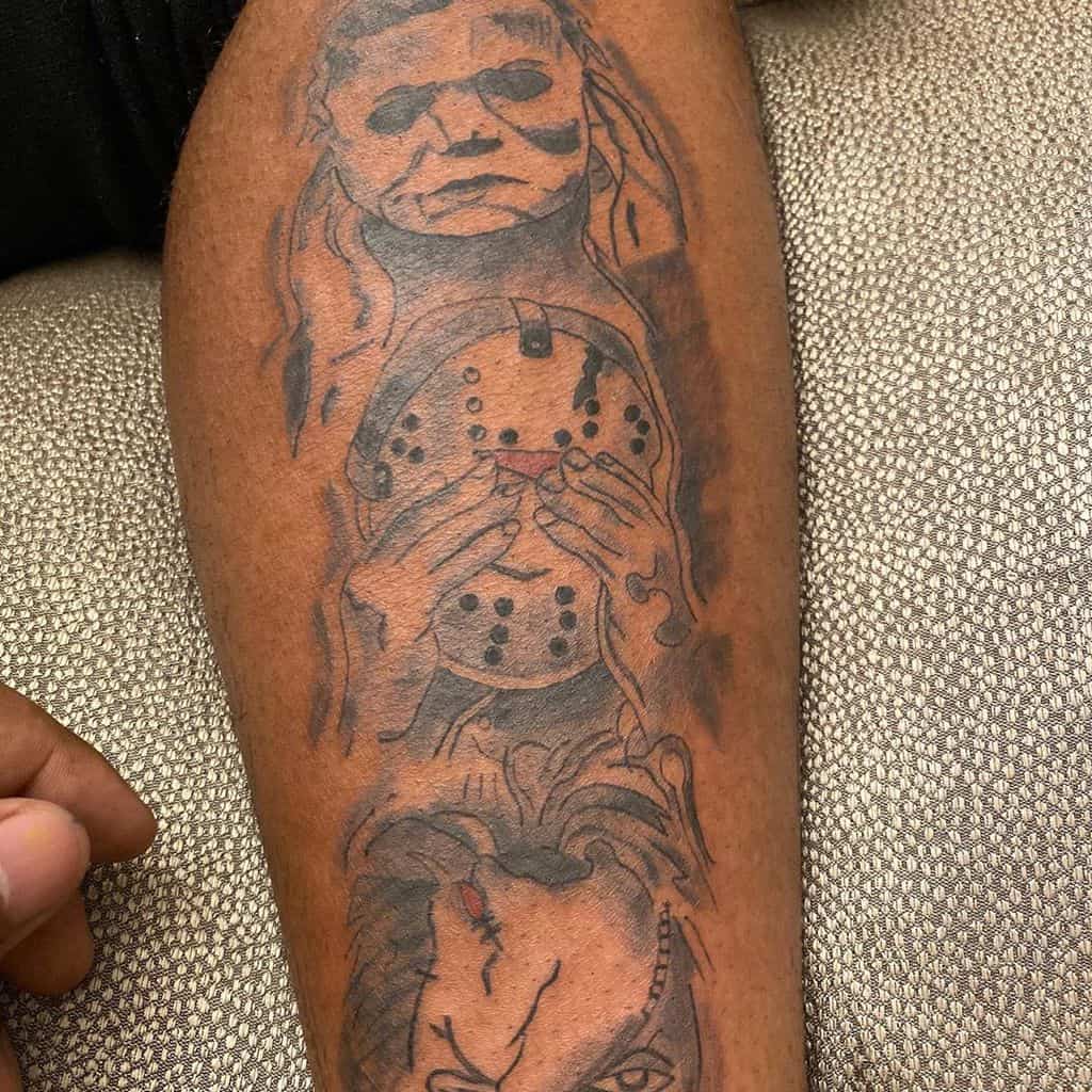 Tattoo of three horror-themed characters, each symbolizing 'Hear No Evil, See No Evil, Speak No Evil,' with detailed shading