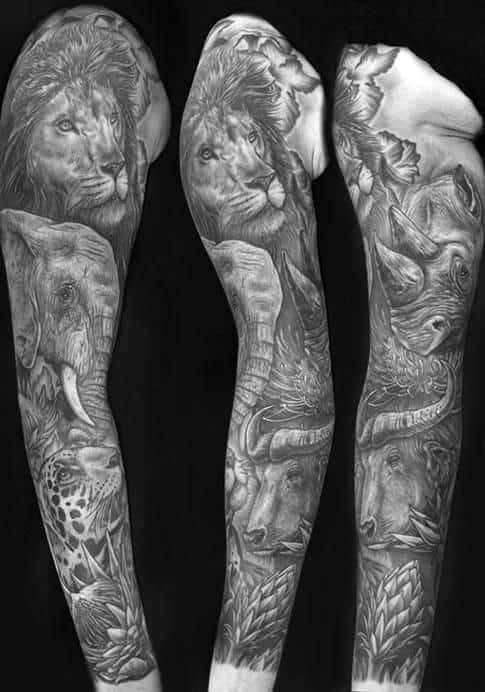 Black and gray wildlife sleeve tattoo featuring a lion, elephant, leopard, and rhino