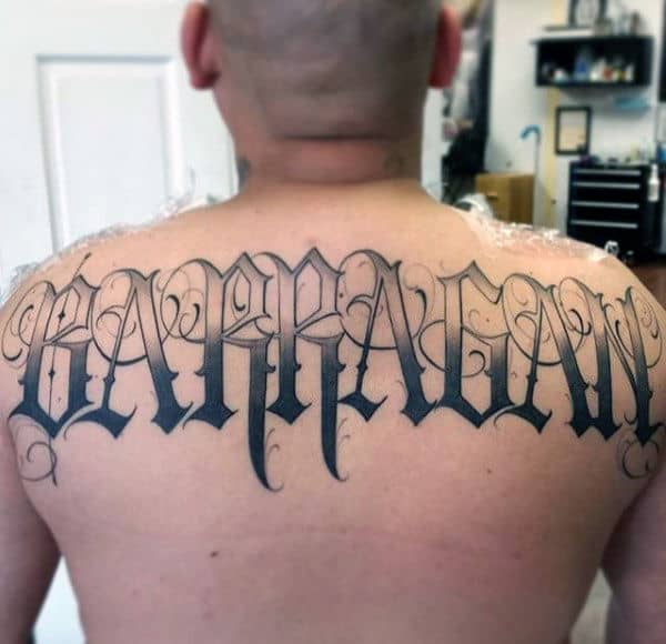 Shaded Old English Male Upper Back Tattoo