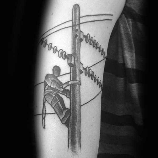 Shaded Old School Lineman Male Tattoo On Arm