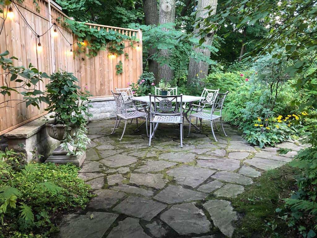 paver patio with wood privacy fence garden 