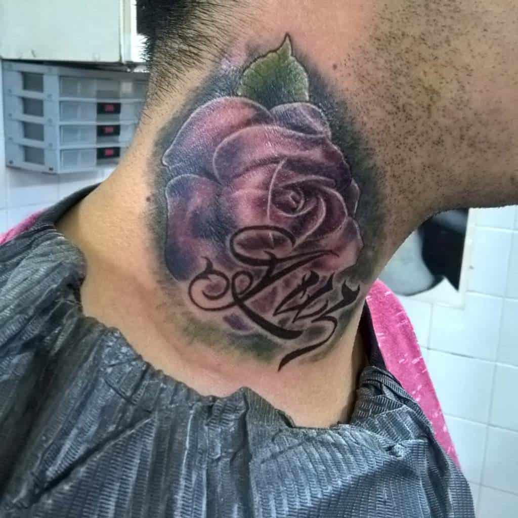 A vibrant neck tattoo featuring a colorful rose elegantly adorned with cursive lettering beneath