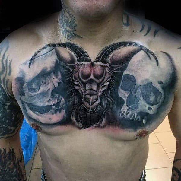 Shaded Skulls With Goat In Middle Mens Chest Tattoo