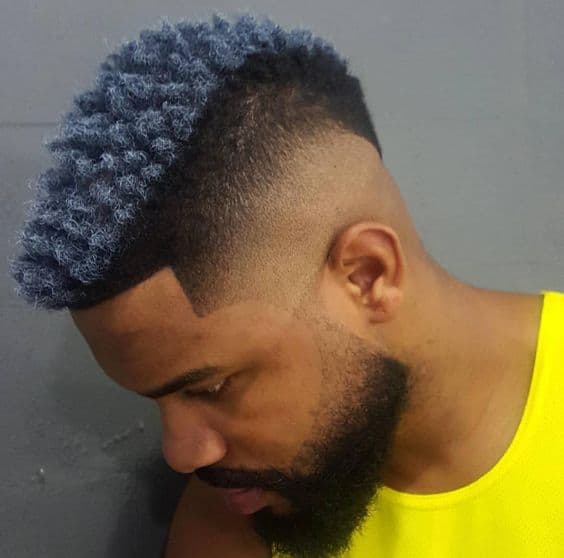 A two-toned frohawk with faded sides