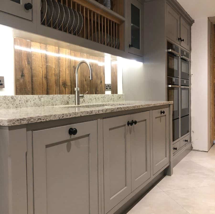 small rustic kitchen four ovens