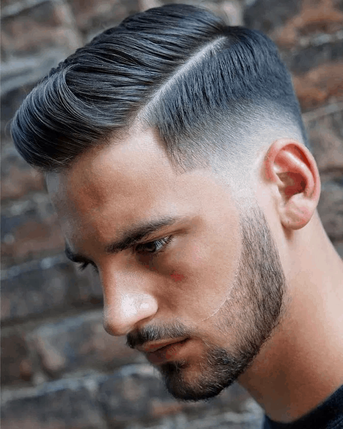 Hair styled into two proportional hair lengths and a low fade