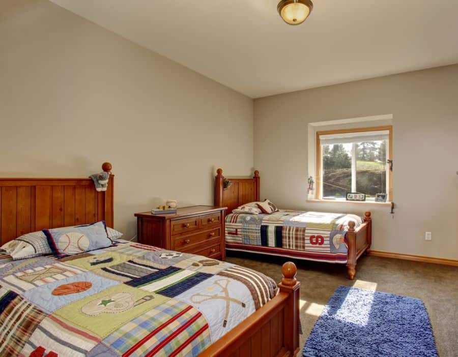 dual wood beds and wood cabinet gray bedroom
