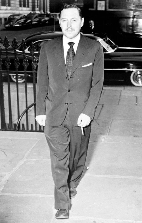 Sharp Black Suit And Tie Mens Fashion From The 1950s Time Period