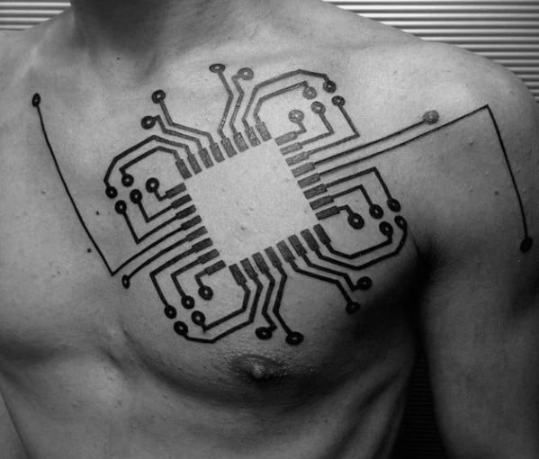 Bold black line tattoo of a microchip design on the chest with symmetrical circuit pathways extending across both shoulders and arms.