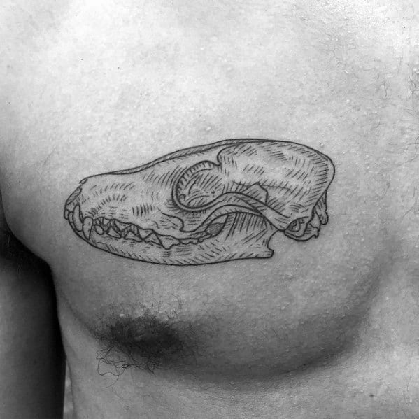 Minimalist chest tattoo of a fox skull outlined with fine black lines and subtle hatching for a clean, anatomical look.