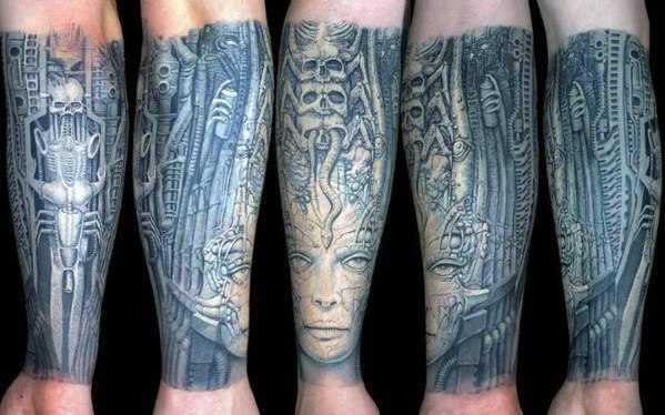 HR Giger-style full leg tattoo featuring biomechanical skulls, tubing, surreal female faces, and intricate alien machinery.