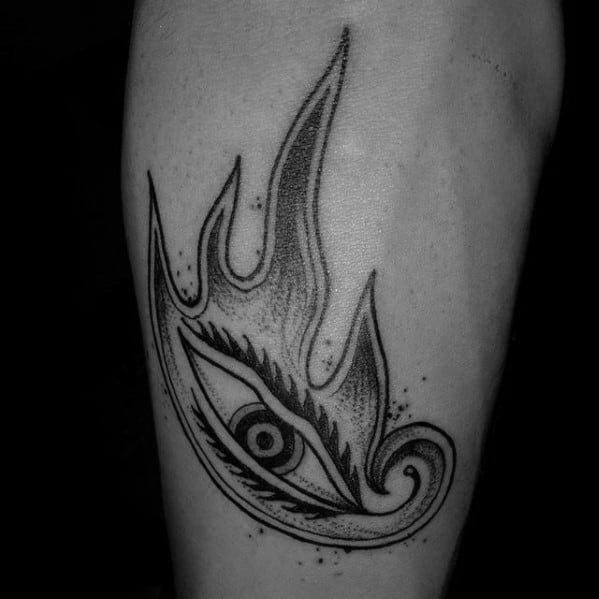 Black Tool-inspired tattoo of a stylized flaming eye with bold lines, dotwork shading, and a minimalist yet intense visual impact.