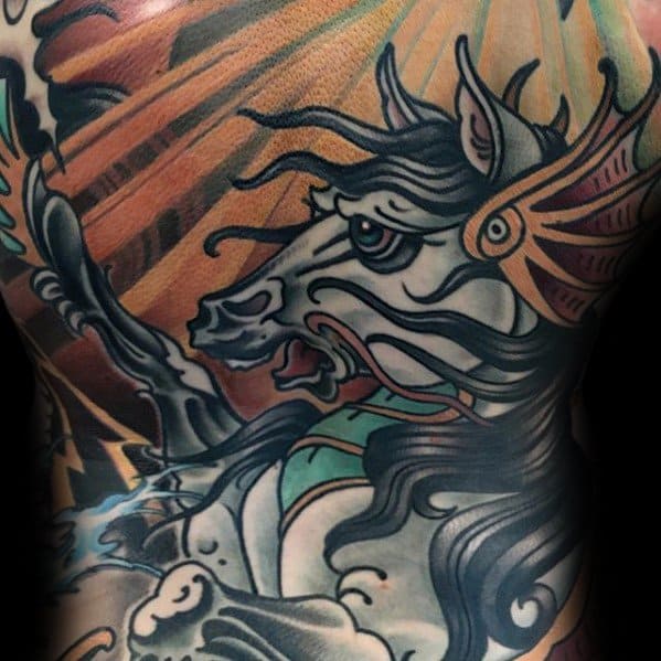 Vibrant traditional tattoo of a dramatic horse head with flowing mane and armor, set against bold sun rays and dynamic linework.