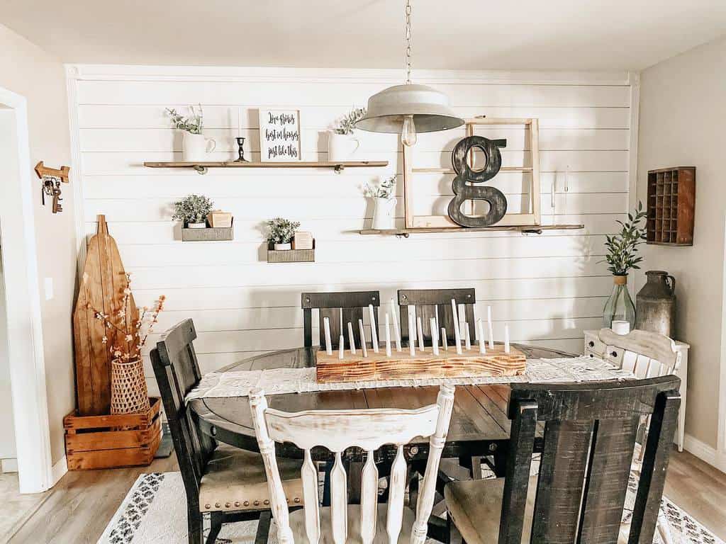 rustic dining room table and chairs long candle holder wall shelf with decorative pieces 