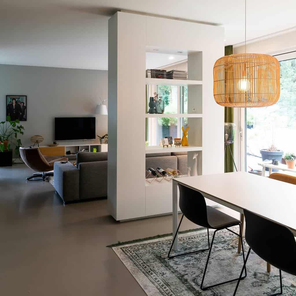 modern open plan dining room living room wall divider with shelves tv 