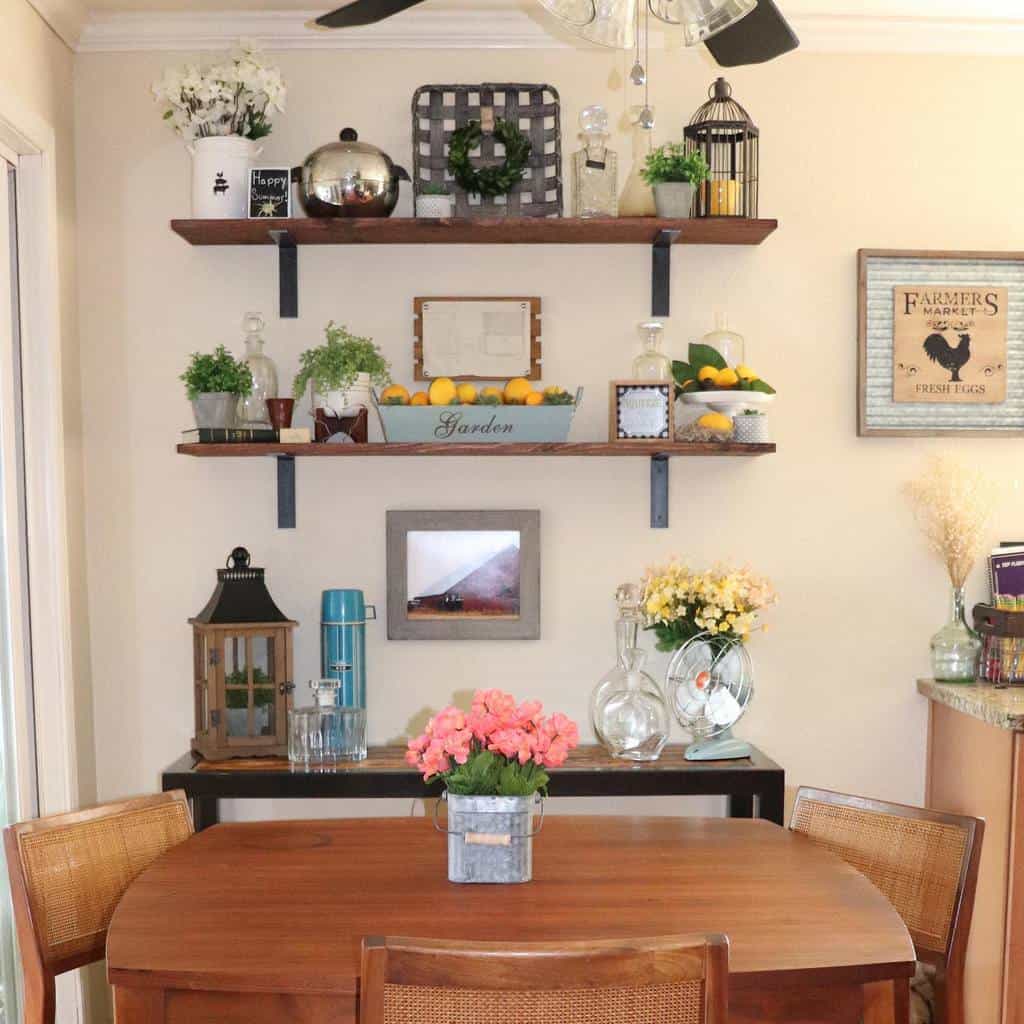 dining room table and chairs wall shelves with decorations flowers lemons plants 