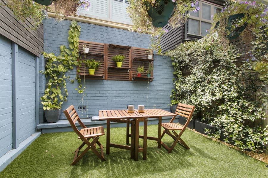 small city garden blue wall outdoor set