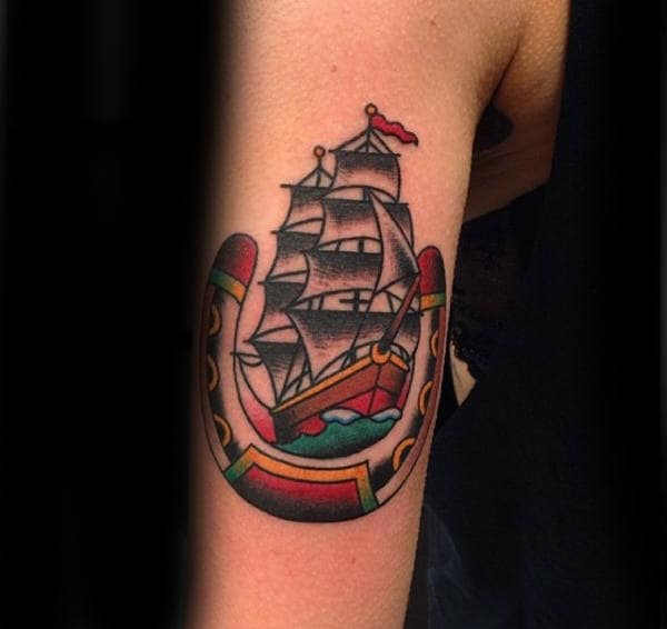 Ship Inside Horseshoe Male Arm Tattoo Ideas