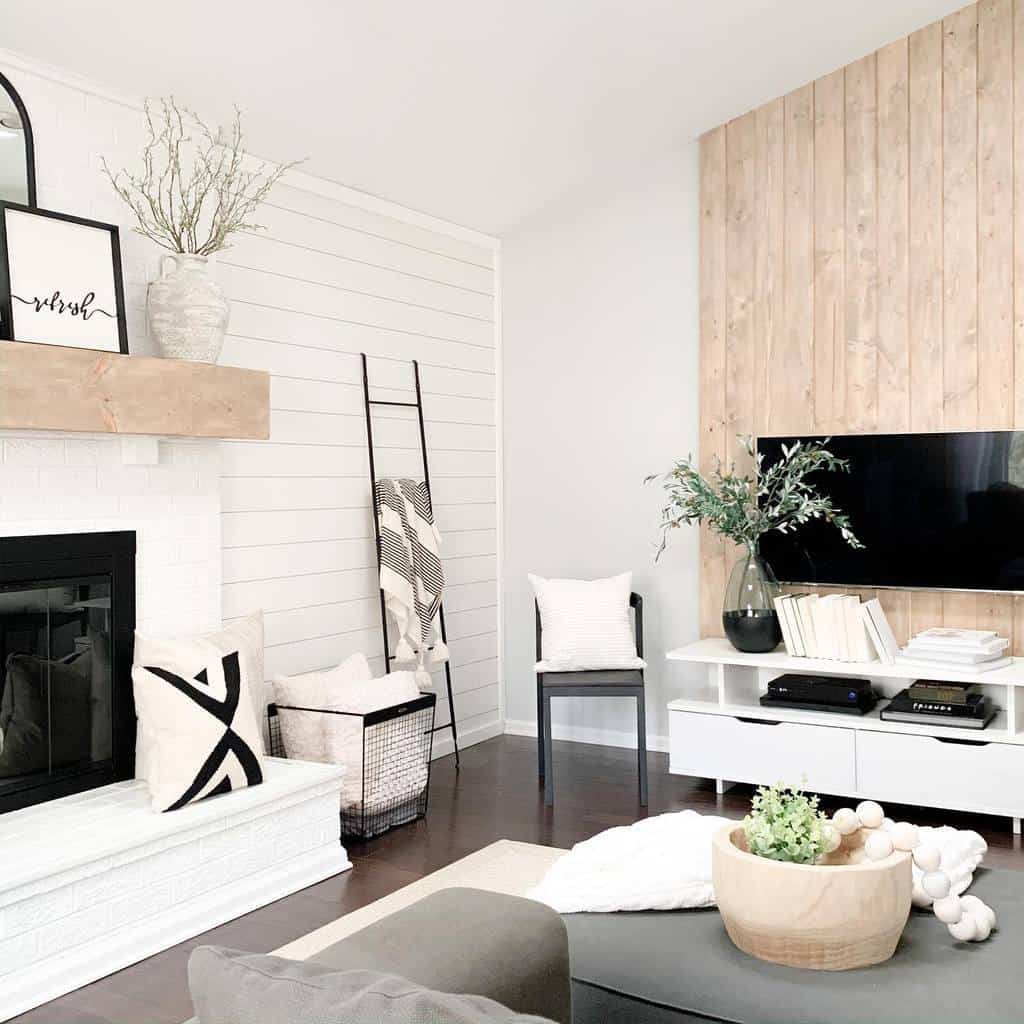 modern living room white shiplap wall fireplace gray sofa wall mounted tv