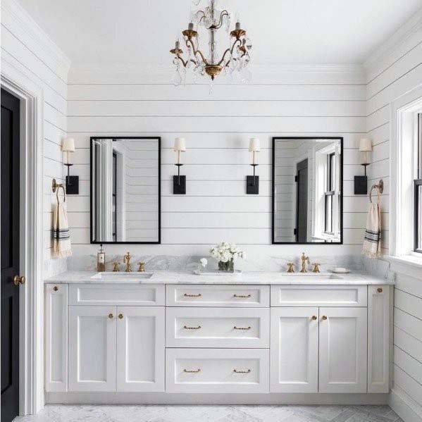 white shiplap wall bathroom with gold accents