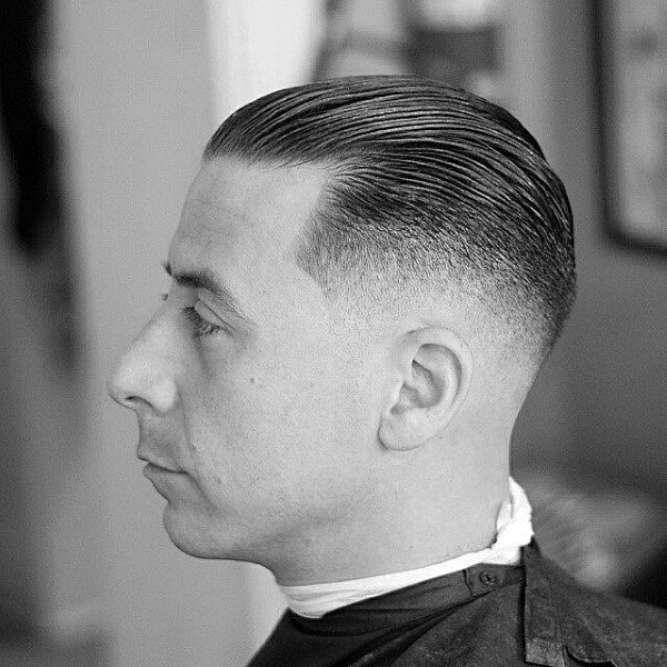 Short Length Mens Skin Fade Haircut Slicked Back