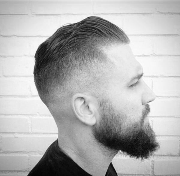 Short Length Slicked Back Skin Fade Haircut For Men