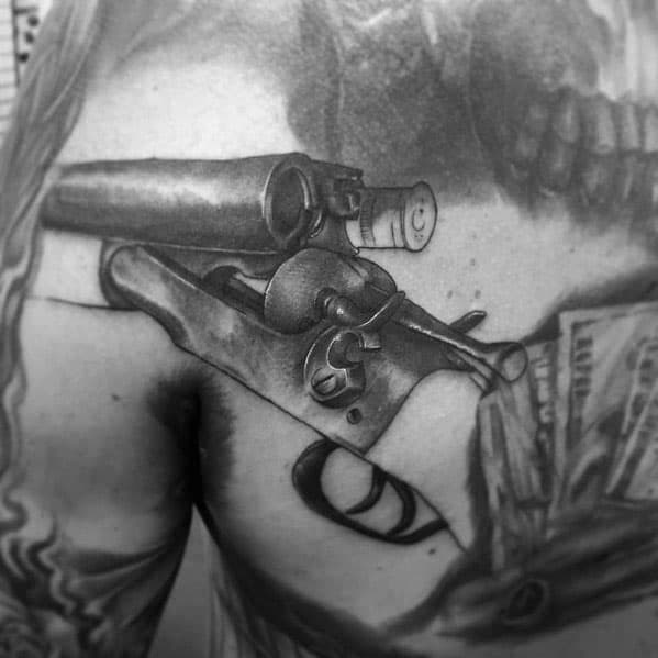 Realistic black and grey tattoo of a double-barrel shotgun being reloaded, featuring intricate shading and fine details for a lifelike design.