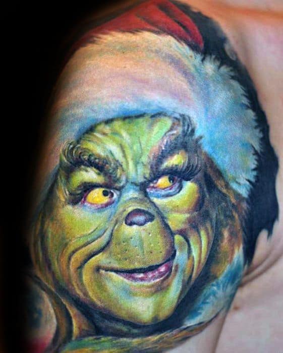 Vibrant Grinch face wearing a Santa hat, with a mischievous and sly expression, detailed with rich green, yellow, and red tones for a playful tattoo design.