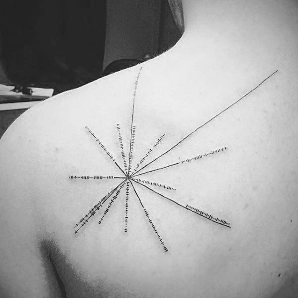 Black and white tattoo of a geometric starburst, reminiscent of a pulsar map, on a person's upper back