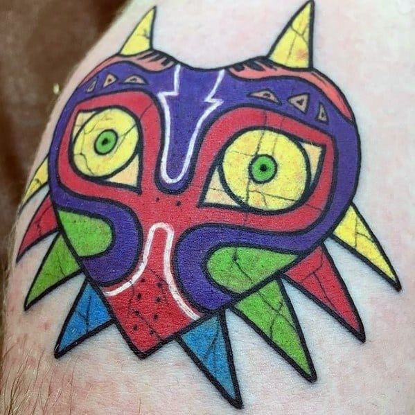 Shoulder Male Tattoo With Zelda Majoras Mask Design