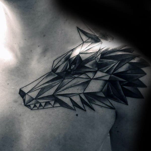 A striking geometric wolf tattoo adorns a man's chest and shoulder, meticulously crafted in black and gray ink