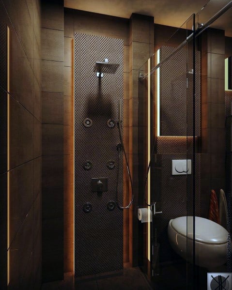 Modern shower with sleek brown tiles, a multi-showerhead panel, and warm LED lighting for a luxurious, ambient atmosphere