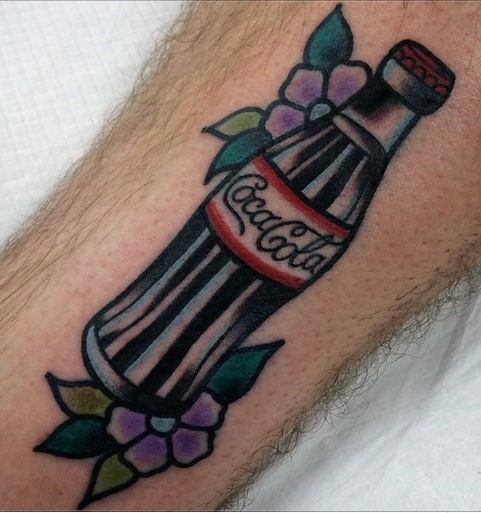 Traditional-style Coca-Cola bottle tattoo with bold outlines, deep black shading, and floral accents for a vintage and classic design.