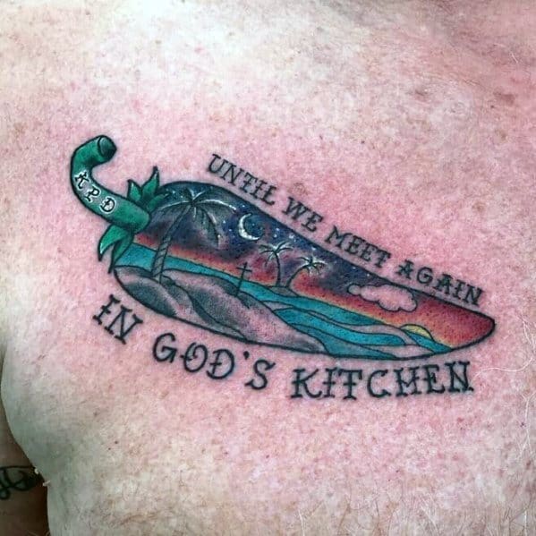 Chili pepper memorial tattoo featuring a serene sunset landscape with the words "Until We Meet Again in God's Kitchen" for a meaningful tribute.